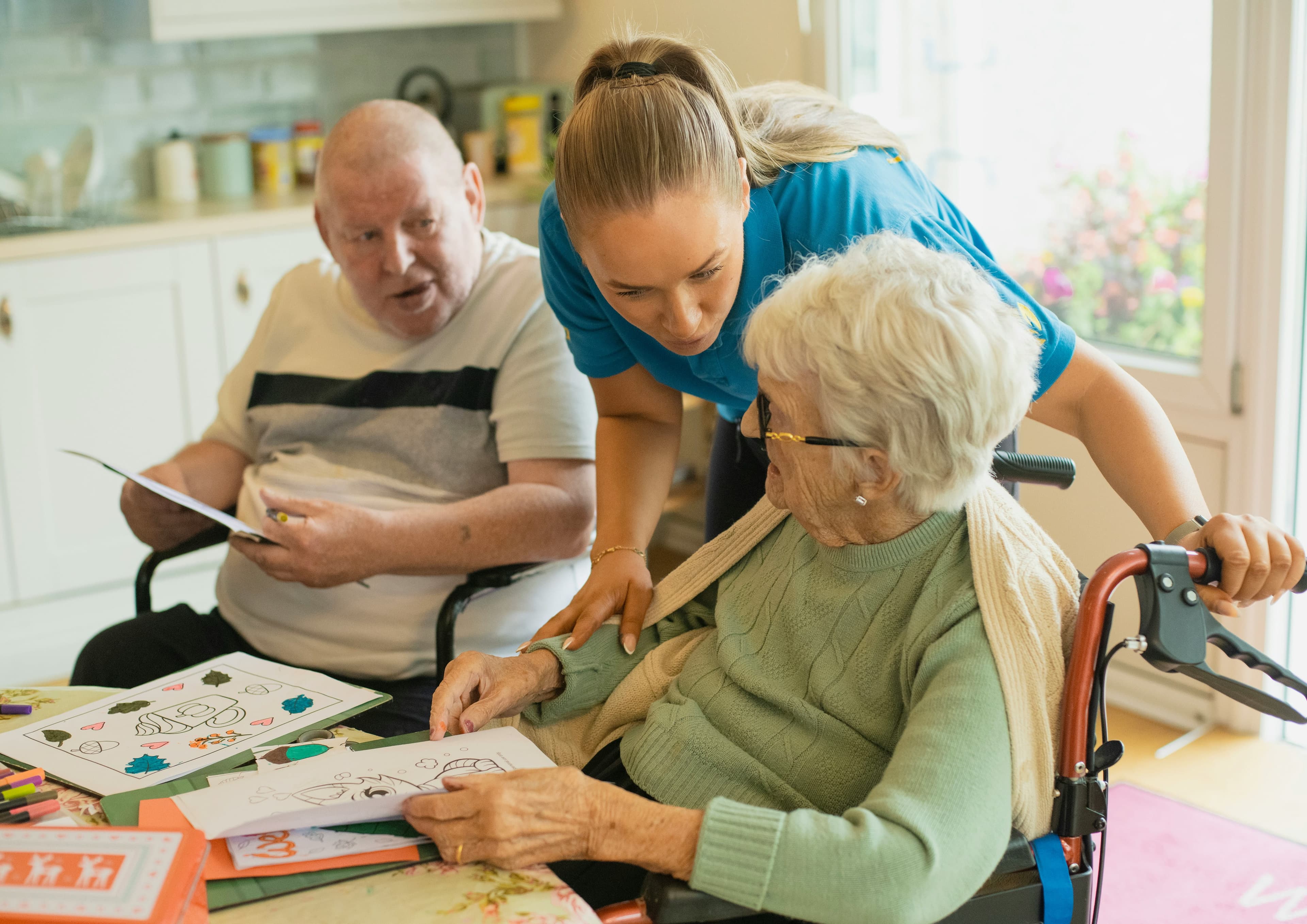 Caregiver with senior at home during evening hours
